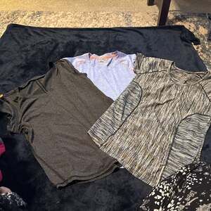 Three gym shirts